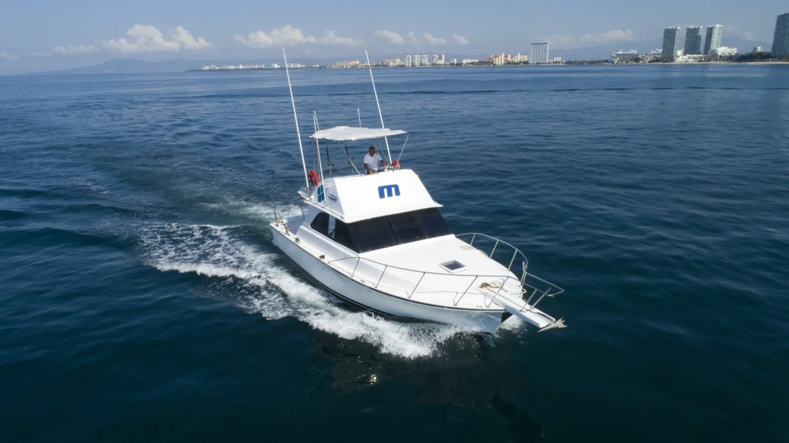Private yacht charter cruising Banderas Bay off Puerto Vallarta on the way to Los Arcos and Yelapa